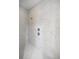 Elegant walk-in shower with large-format marble-look tile at 3993 Se 10Th Ave, Ocala, FL 34480