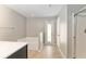 Bathroom featuring a soaking tub, tiled floors, and glass-enclosed shower at 4531 Se 27Th St, Ocala, FL 34480
