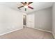 Bedroom with carpeting, ceiling fan, and closet at 4531 Se 27Th St, Ocala, FL 34480