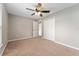 Bedroom featuring ceiling fan and a closet at 4531 Se 27Th St, Ocala, FL 34480