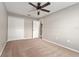 Bedroom featuring ceiling fan and a closet at 4531 Se 27Th St, Ocala, FL 34480