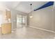 Open dining area with sliding glass doors to a screened patio, offering indoor-outdoor living at 4531 Se 27Th St, Ocala, FL 34480