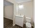 Well-lit bathroom featuring a modern vanity with stylish fixtures and a toilet at 5 Bahia Circle Pl, Ocala, FL 34472