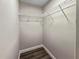 Walk-in closet with wire shelving and wood-look flooring at 5 Bahia Circle Pl, Ocala, FL 34472