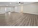 Spacious living room with sleek flooring, neutral walls, and abundant natural light at 5 Bahia Circle Pl, Ocala, FL 34472