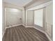 Bright walk-in closet with sleek flooring, neutral walls, and custom shelving at 5 Bahia Circle Pl, Ocala, FL 34472