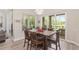 Bright dining room with large windows offering great outdoor views at 5034 Nw 75Th Ave, Ocala, FL 34482