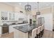 Bright, open kitchen features a large island, granite countertops, and stainless steel appliances at 5034 Nw 75Th Ave, Ocala, FL 34482
