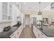Bright kitchen featuring granite countertops, stainless steel appliances and plenty of cabinet space at 5034 Nw 75Th Ave, Ocala, FL 34482