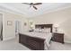 Bright and airy main bedroom with a ceiling fan, and tasteful decor at 5034 Nw 75Th Ave, Ocala, FL 34482