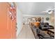 Bright and welcoming foyer leading to a spacious living area and kitchen, featuring tile flooring and an open layout at 5390 Se 15Th Ct, Ocala, FL 34480