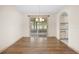 Dining room features a sliding glass door and doorway to the kitchen at 6495 Sw 109Th St, Ocala, FL 34476