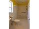 Bright bathroom featuring a tiled walk-in shower, safety bars, and a patterned floor at 7 Pecan Drive Loop, Ocala, FL 34472