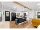 Bright kitchen with island, marble countertops, stainless appliances, and natural light at 802 Ne 39Th Ct, Ocala, FL 34470