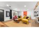 Cozy living room featuring a sectional couch, bright lighting, and rustic accents at 802 Ne 39Th Ct, Ocala, FL 34470