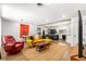 Bright living room with an open layout, modern decor, and stylish kitchen area at 802 Ne 39Th Ct, Ocala, FL 34470