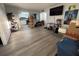 Open-concept living room seamlessly connects to the kitchen, featuring modern flooring and ample space for relaxation at 8134 Fairways Cir # R203, Ocala, FL 34472