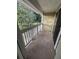 Enjoy nature views from this private, covered patio, perfect for relaxing outdoors at 8134 Fairways Cir # R203, Ocala, FL 34472