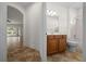 Bathroom featuring a vanity, toilet, and shower/tub combo at 8640 Sw 83Rd Loop, Ocala, FL 34481