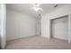 Spacious bedroom with a ceiling fan and closet at 8640 Sw 83Rd Loop, Ocala, FL 34481