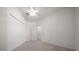 Bedroom with ceiling fan and closet at 8640 Sw 83Rd Loop, Ocala, FL 34481