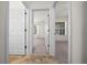 Hallway with an open doorway view to bedrooms at 8640 Sw 83Rd Loop, Ocala, FL 34481