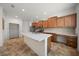 Well-equipped kitchen with stainless steel appliances, a central island, and ample counter space at 8640 Sw 83Rd Loop, Ocala, FL 34481