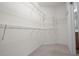Walk-in closet with wire shelving and carpet at 8640 Sw 83Rd Loop, Ocala, FL 34481