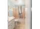 Cozy bathroom featuring a vanity and shower-tub combo at 8704 Sw 94Th Ln # G, Ocala, FL 34481