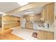 Kitchen area with wood cabinets and tile flooring at 8704 Sw 94Th Ln # G, Ocala, FL 34481