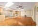 Bright living room and kitchen area with tile and wood floors, and plenty of natural light at 8704 Sw 94Th Ln # G, Ocala, FL 34481