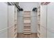 Spacious walk-in closet with built in shelving and ample hanging storage at 9641 Se 70Th Ter, Ocala, FL 34472