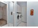 Convenient laundry room with cabinetry, modern washer and dryer, and natural lighting at 9641 Se 70Th Ter, Ocala, FL 34472