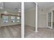Spacious living room boasts tile floors, carpet, and large windows at 9641 Se 70Th Ter, Ocala, FL 34472