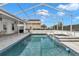 Inviting screened-in pool and spa with patio area, ideal for outdoor entertaining and leisure at 9641 Se 70Th Ter, Ocala, FL 34472