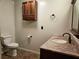 Updated bathroom with granite vanity and tiled floor at 9805 Se 182Nd Avenue Rd, Ocklawaha, FL 32179