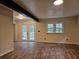 Spacious living room with hardwood floors and natural light at 9805 Se 182Nd Avenue Rd, Ocklawaha, FL 32179