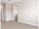 Bedroom featuring a walk-in closet and bright interior at 10008 Sw 85Th Place Rd, Ocala, FL 34481