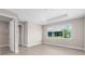 Bright bedroom with natural light and a view of the backyard at 10008 Sw 85Th Place Rd, Ocala, FL 34481