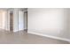 Empty bedroom with tile flooring and access to the walk-in closet at 10008 Sw 85Th Place Rd, Ocala, FL 34481