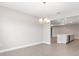 Empty Dining Room with a view of the modern kitchen area at 10008 Sw 85Th Place Rd, Ocala, FL 34481