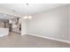 Empty Dining Room with a view of the modern kitchen and appliances at 10008 Sw 85Th Place Rd, Ocala, FL 34481