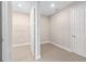 Laundry room with tile floor, closet, and door to a bedroom at 10008 Sw 85Th Place Rd, Ocala, FL 34481