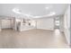 Open-concept living space featuring a modern kitchen, recessed lighting, and tile flooring at 10008 Sw 85Th Place Rd, Ocala, FL 34481