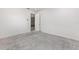 Clean and modern room with an open doorway offering flexible space for various purposes at 10026 Sw 85Th Place Rd, Ocala, FL 34481