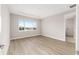 Bright bedroom features a large window, recessed lighting and an en-suite bathroom at 10045 Sw 82Nd Place Rd, Ocala, FL 34481