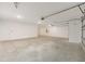 Spacious garage with concrete floor and automatic door opener at 10045 Sw 82Nd Place Rd, Ocala, FL 34481