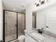 Modern bathroom design with tiled shower, granite vanity, and contemporary fixtures at 1083 Sw Winding Hills Rd, Dunnellon, FL 34431