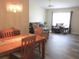 Dining room featuring wood floors and an open floor plan at 11470 Sw 139Th St, Dunnellon, FL 34432