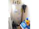 A home's water heater along with laundry detergent and cleaning supplies at 11470 Sw 139Th St, Dunnellon, FL 34432